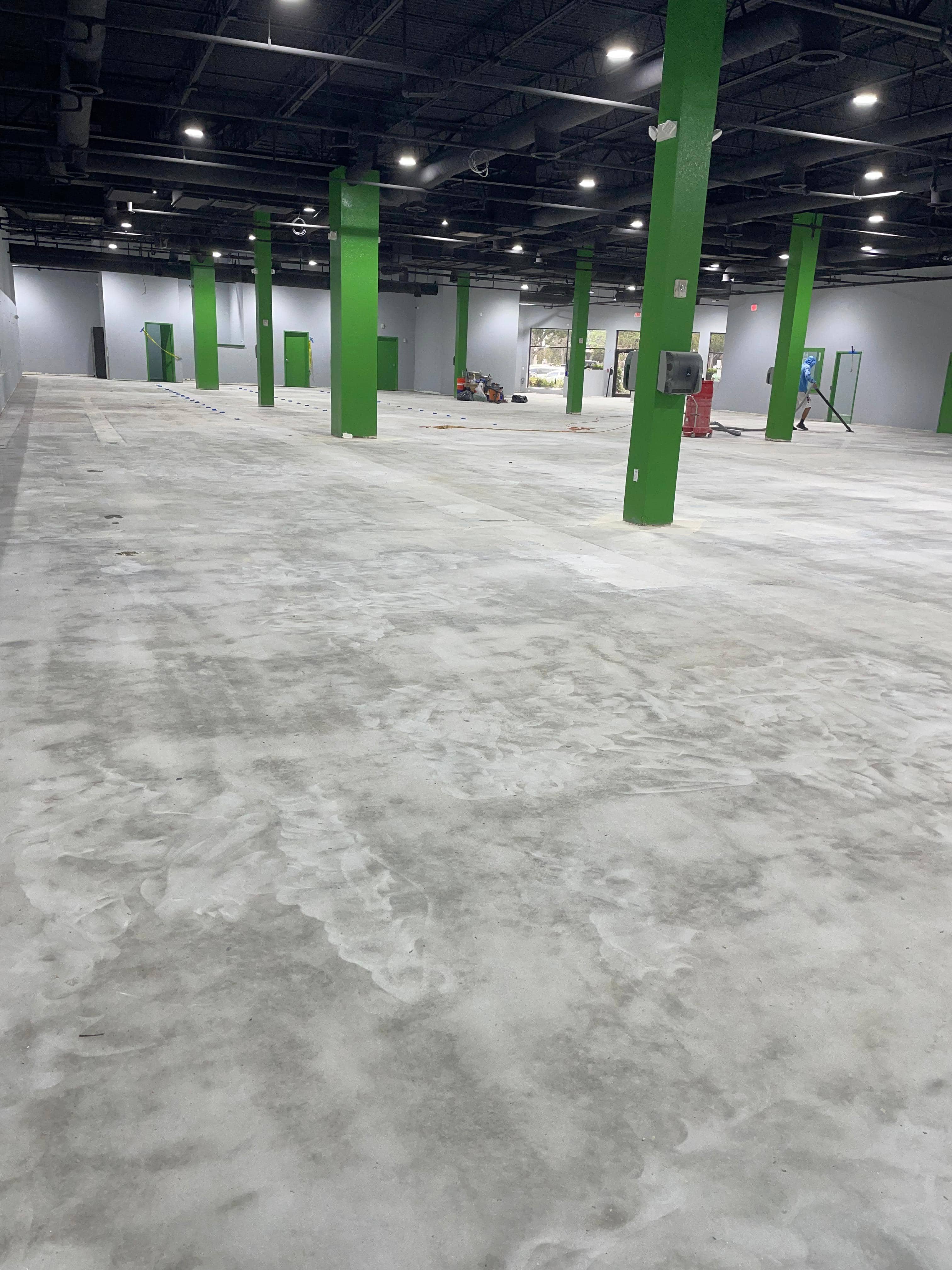 Bare concrete garage floor before epoxy