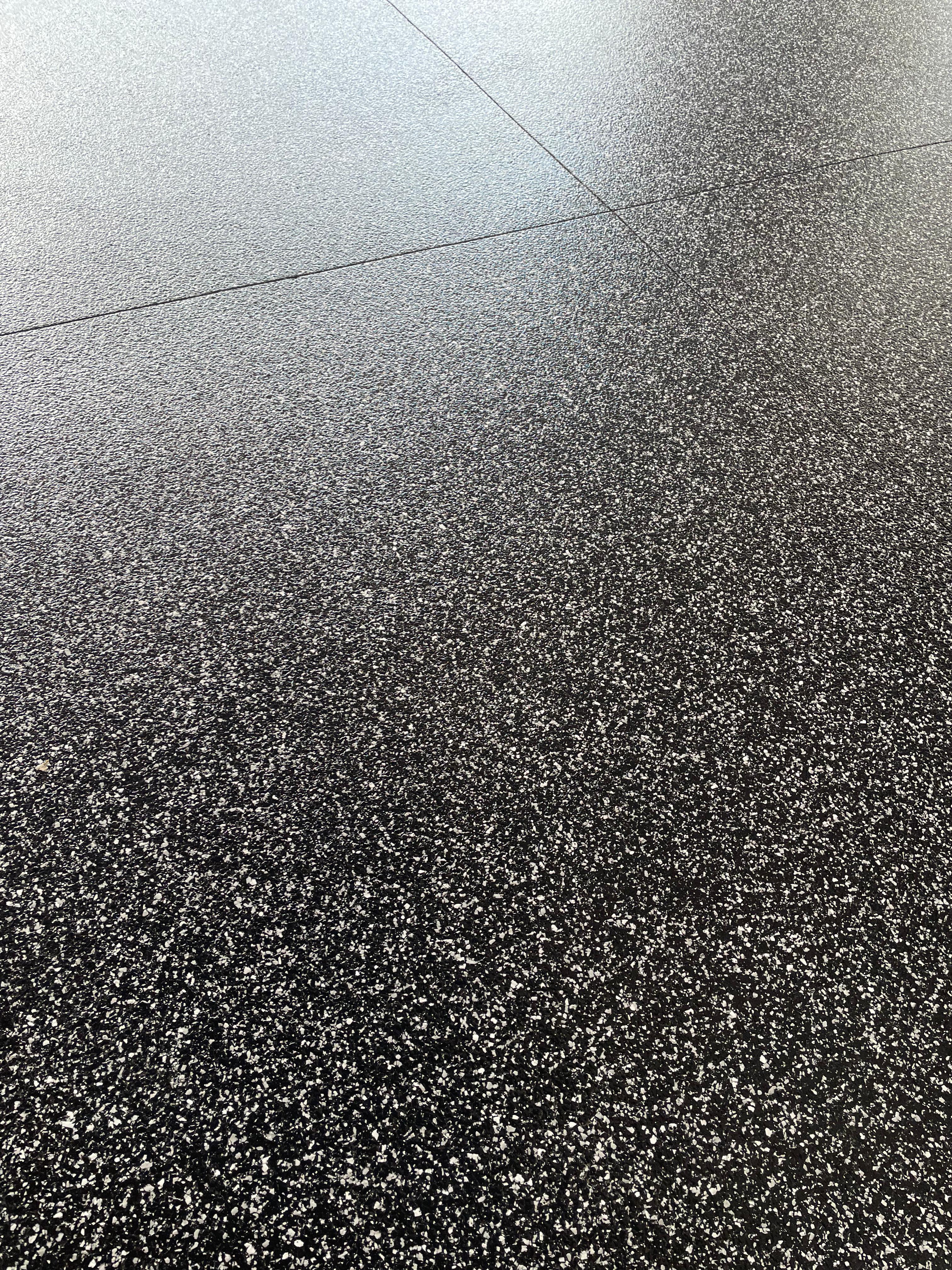 Custom epoxy garage floor by JA Brothers Construction