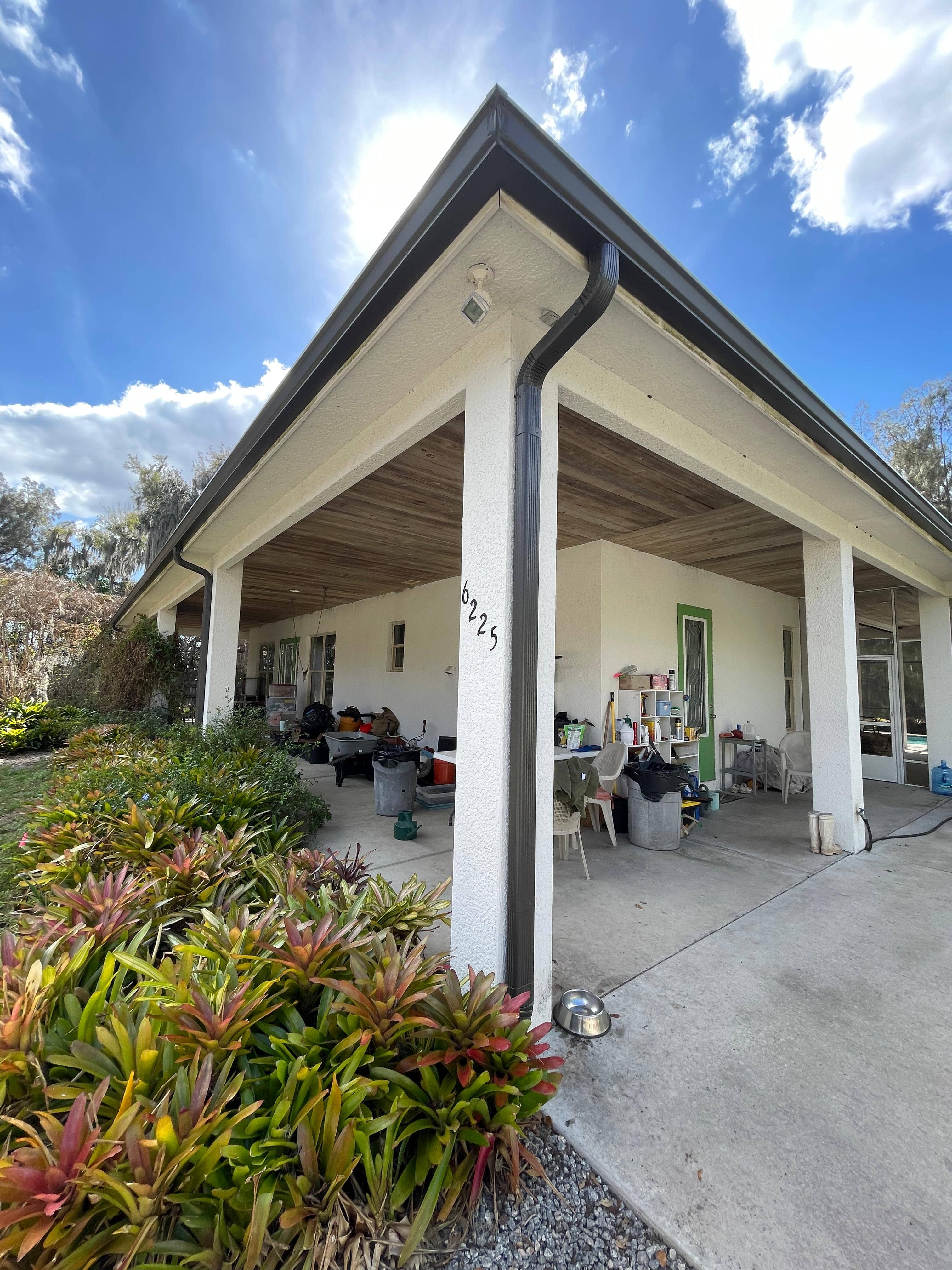 Roofline after seamless gutter installation