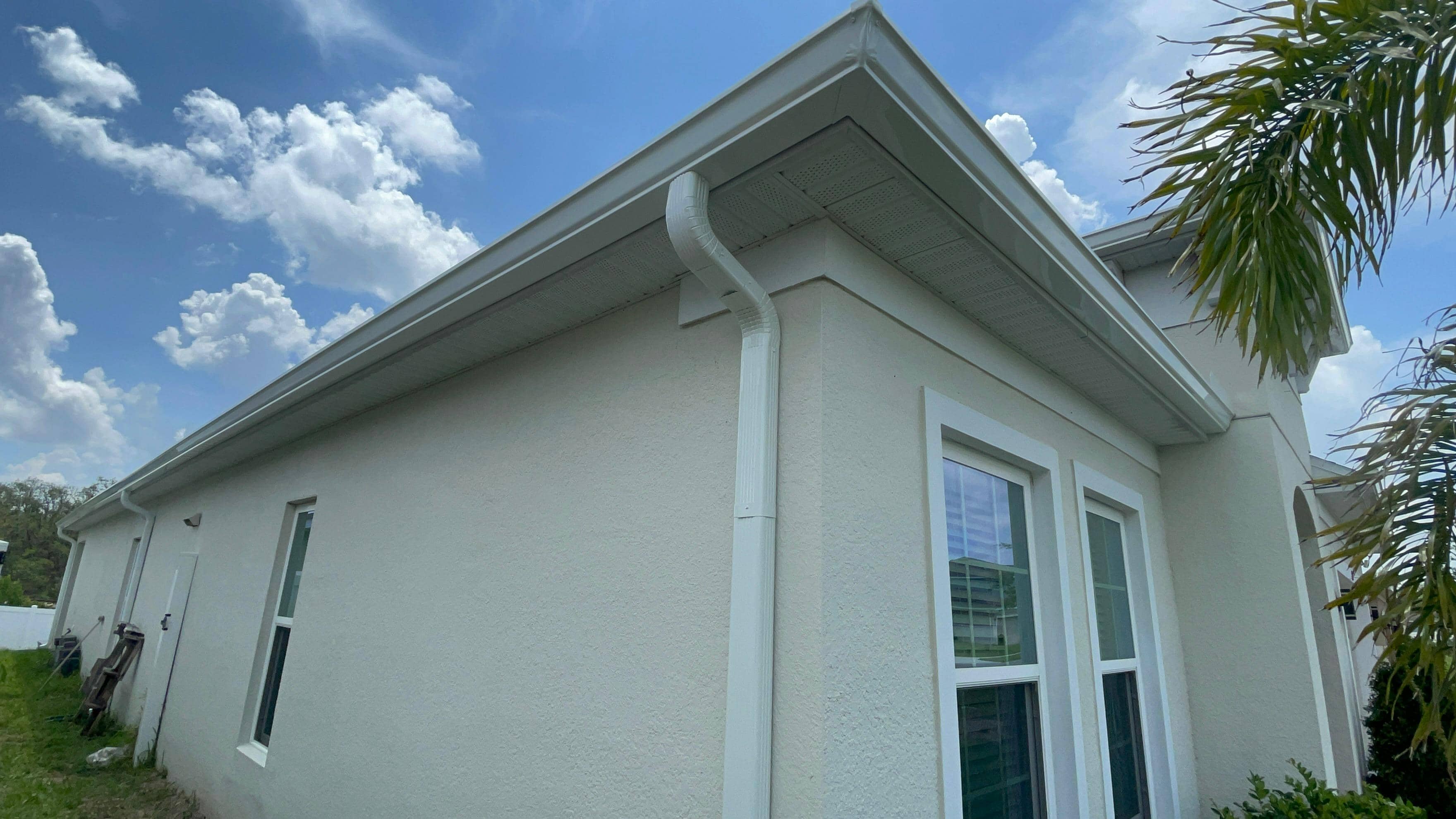 Installed gutters on Florida home exterior